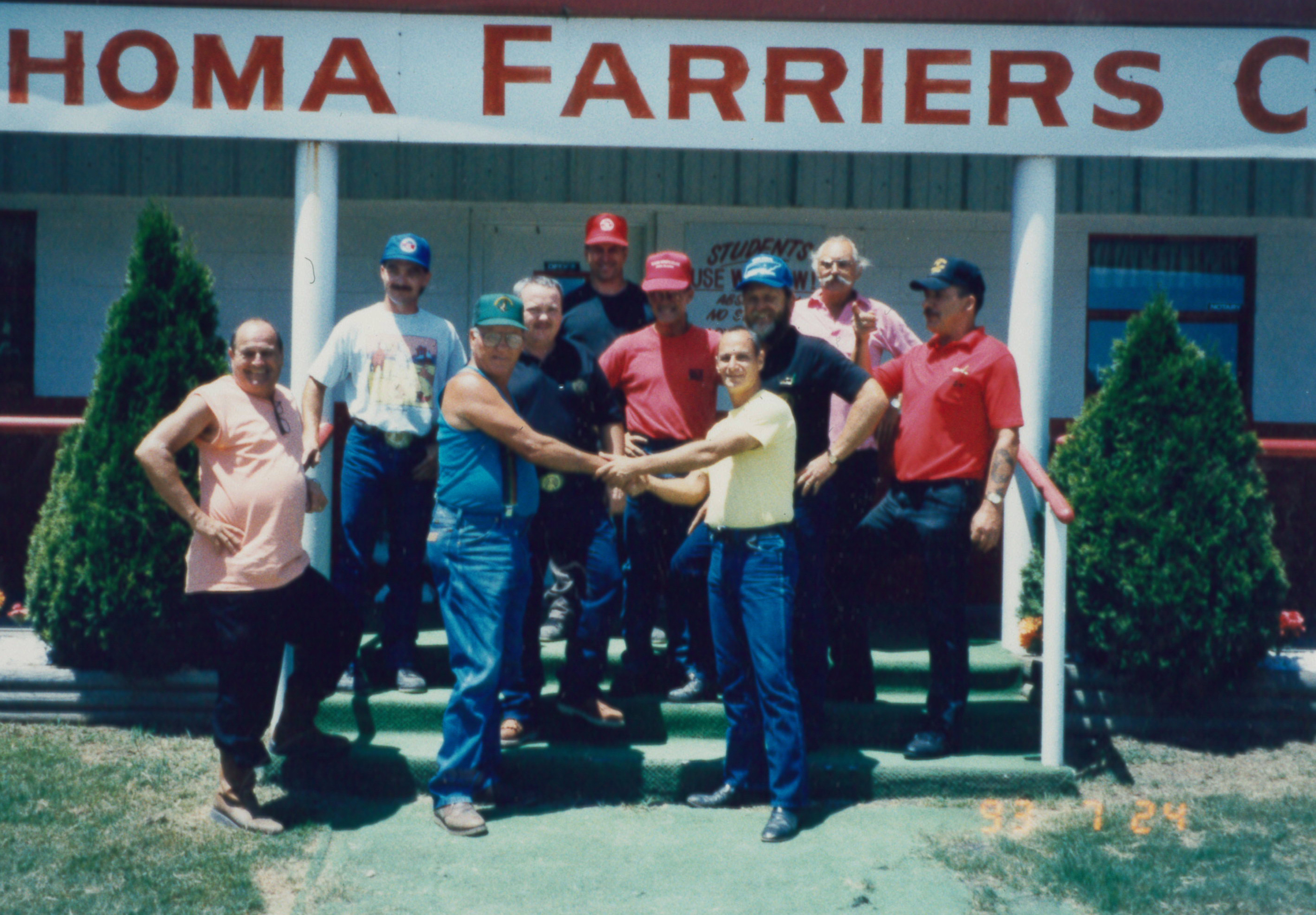Bud Beaston front left in blue, shaking hands. 1990, Cross Country Tour