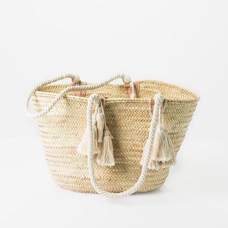 Our popular straw tote is on sale for $80! This versatile straw tote is great all year round for use at the farmer's market or grocery store. Completely handwoven, cotton straps are reinforced to the basket with durable leather stitching. Buy anytime