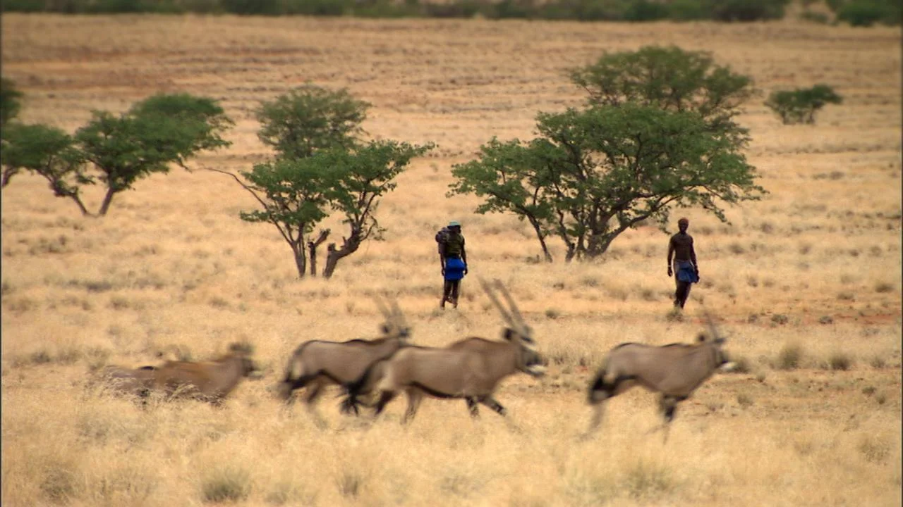 Community game guards and Oryx, Marienfluss Valley, Namibia
