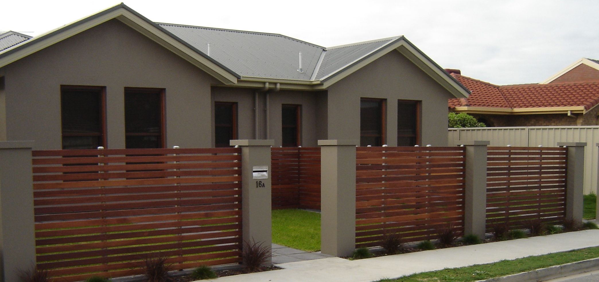 Modern-Exterior-Gate-Design-Of-Modern-Gate-Design-Simple-Wooden-Gate-Small-Garden-Dark-Grey-Wall-Colour.jpg