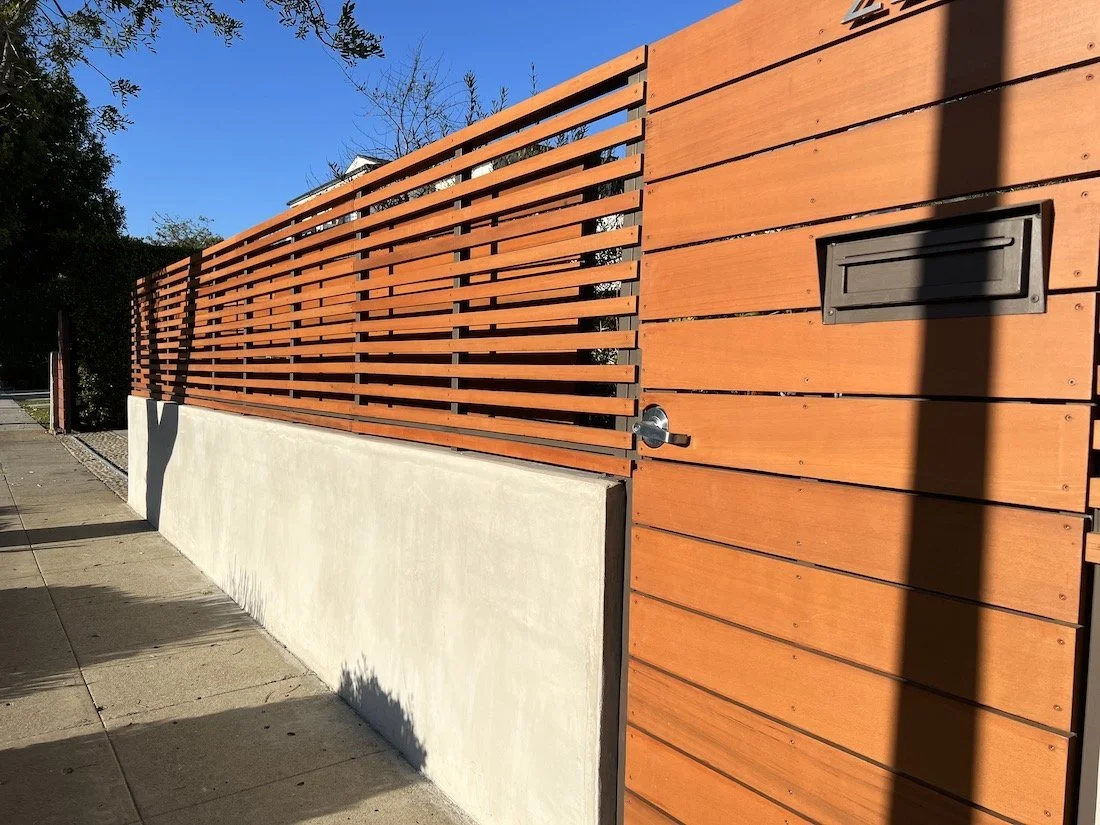 Why Your Gate Wears Out Before Your Fence (And How to Refinish It)