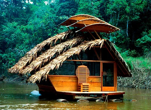 Completed in eight days by Catholic University of America students, the Floating Eco Lodge is an ironwood structure set atop a balsa raft. The thatch roof allows some natural light inside but blocks the most intense rays and heat. The pitched roof a…