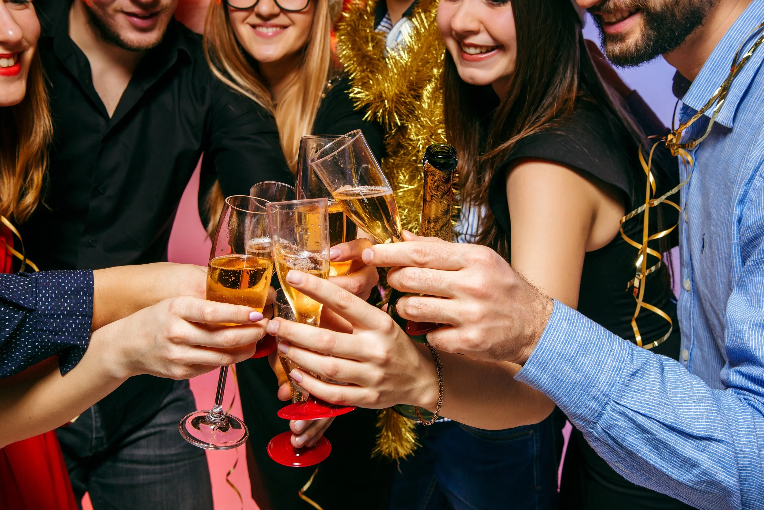 Xmas many-young-women-men-drinking-christmas-party.jpg