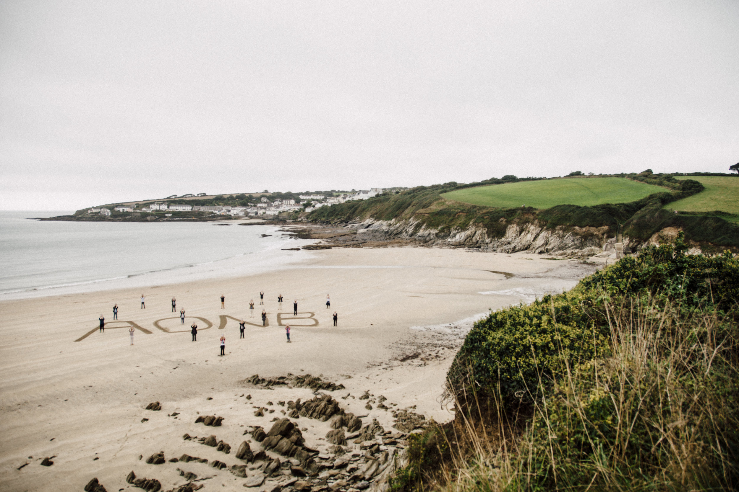 AONB Partners celebrate the Management Plan launch at Porthcurnick beach - all images by Emma Coster.