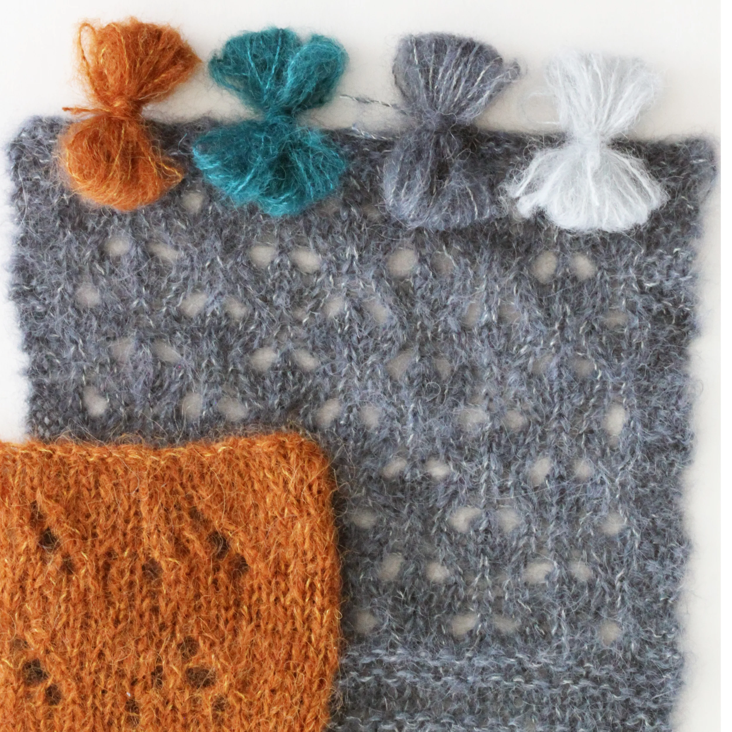 Yarn butterflies shown in (left to right): #902/Rust, #904/Teal, #913/Slate and #911/Silver Swatches shown in: #902/Rust and #913/Slate