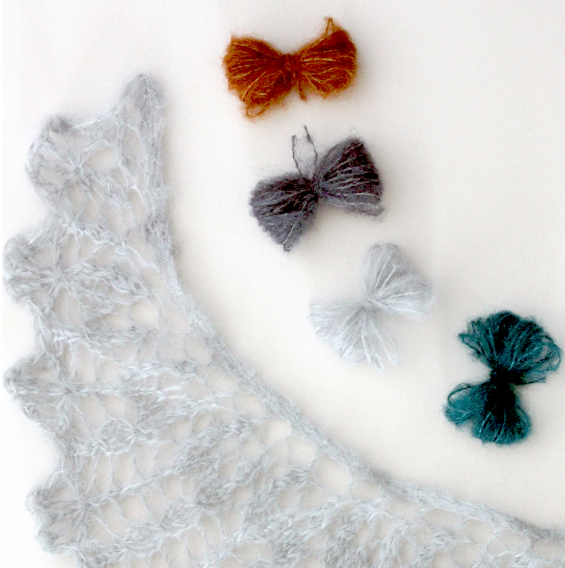 Shawl shown in #911/Silver, yarn butterflies shown in #902/Rust, #931/Slate, #911/Silver and #904/Teal