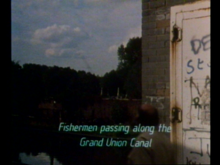 Fishermen passing along the Grand Union Canal