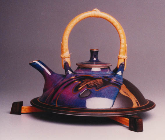 Flat Teapot 18 cms. h. with trivot in rare Tasmanian woods