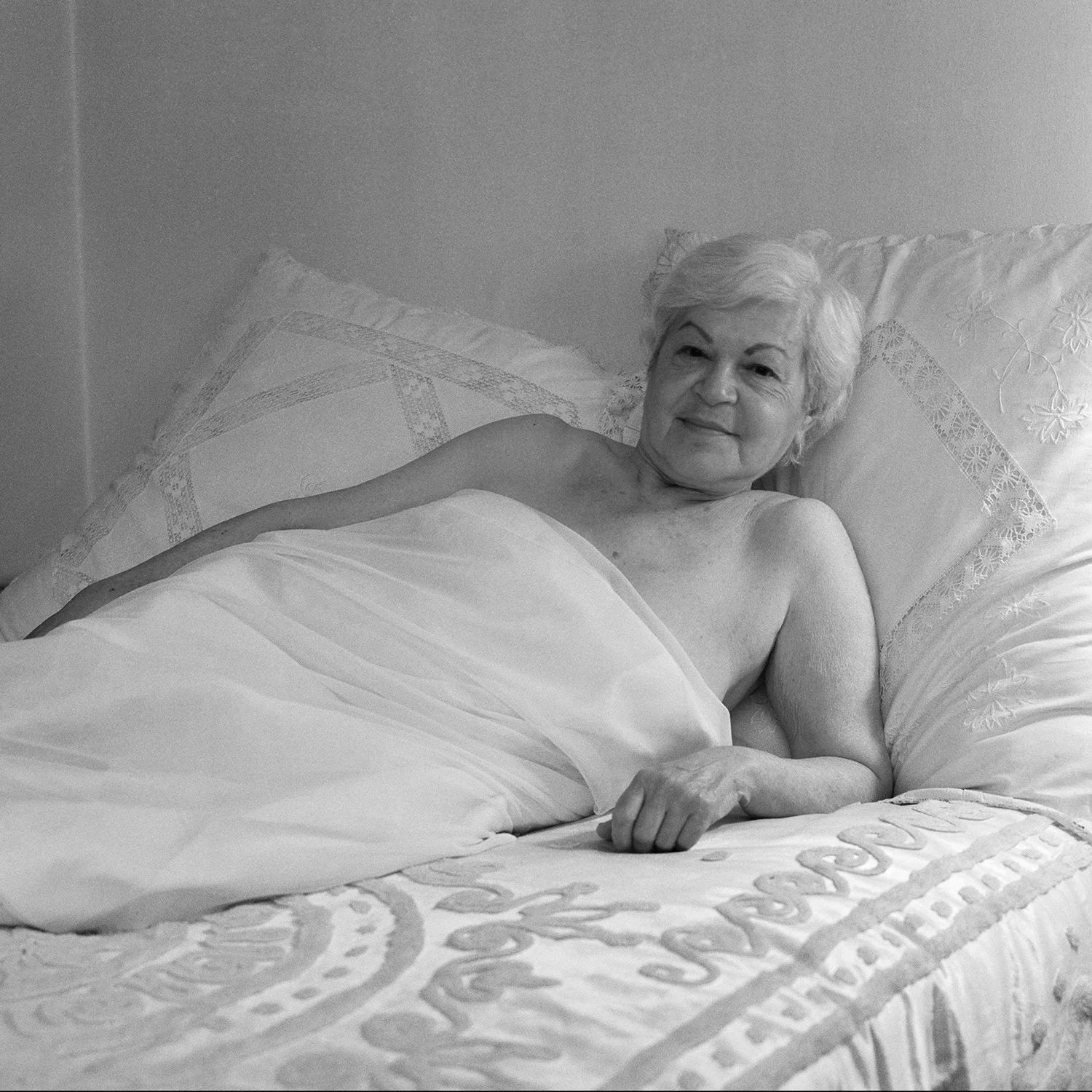 Sadie in white bed.jpg