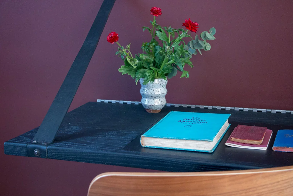 Folding desk by Nafco Studio Materials: Ebonized Oak & Leather Strap Location: Guest Bedroom, Industrial Cast Iron Soho Loft