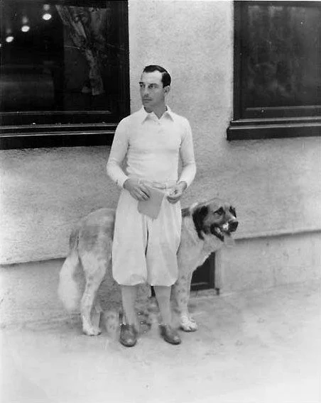 Buster Keaton (1930) The Studio system at MGM (and every other major film studio) ensured that every aspect of the film making process remained within their control – including the private lives of their film stars. Unsurprisingly this was unpopular with most of them, and when Buster Keaton was forced to rent a bungalow on the MGM lot in 1929 he promptly hung a sign outside which said “KEATON’S KENEL”. He told his bosses it was in honour of his Saint Bernard, Elmer, but it soon became known as an anti-establishment watering hole. Elmer fared rather better, and was often taken for long walks by Greta Garbo.