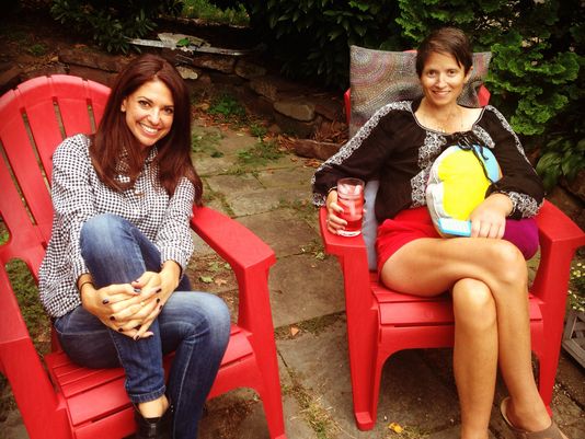 A photo of the two friends in Olivia's cheery backyard, taken this fall. (Photo: Andrea Mandell)