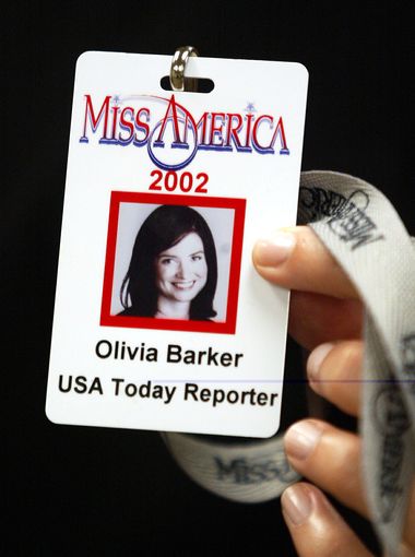 Olivia's Miss America credential. The assignment "let me step into the hose and heels and beaded gowns as the hypothetical 52nd contestant," she wrote. (Photo: Eileen Blass, USA TODAY)