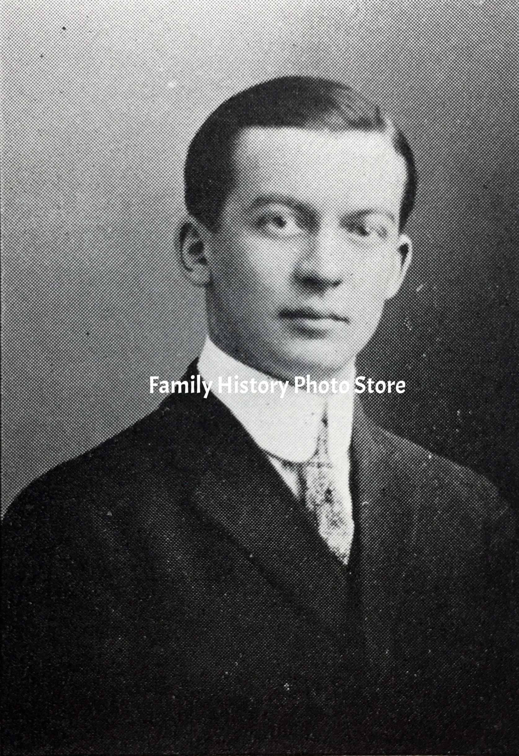 Raymond E Broholm