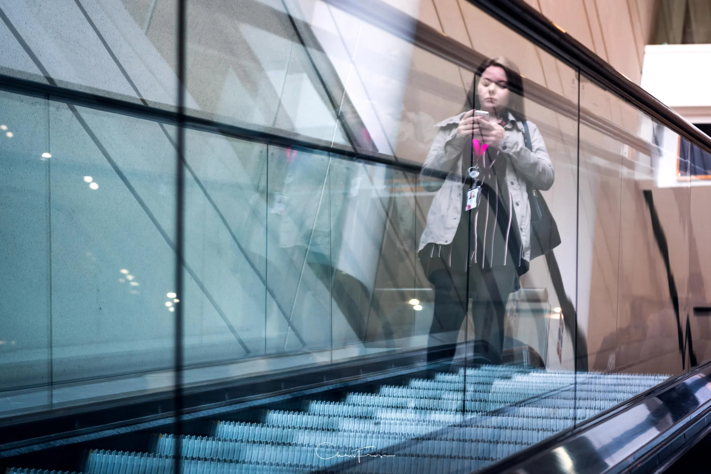 I saw the different colour temperatures on the entrance escalators and then tried to get this ghostly reflection photograph. Rode these escalators for about ten minutes