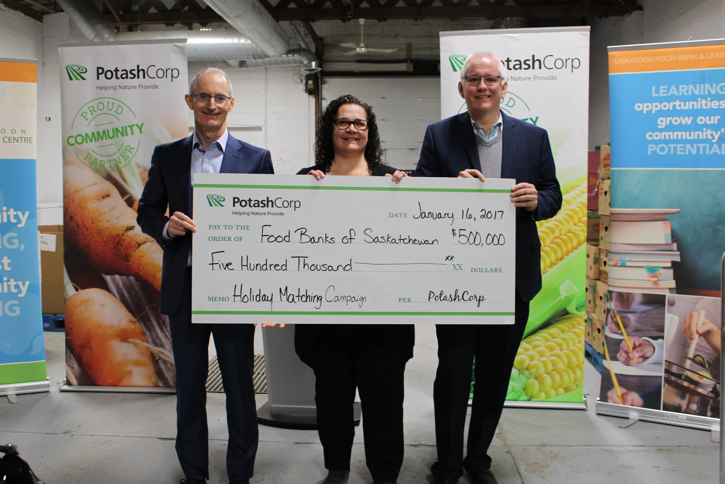 (Left to right) Jochen Tilk President and CEO of Potash Corp , Laurie O'Connor Executive Director of SFBLC and Steve Compton Executive Director of Food Banks of Saskatchewan.
