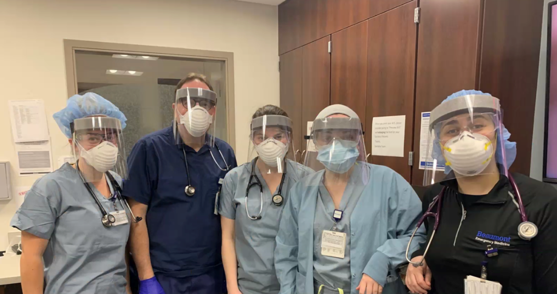  Medical staff wear alternative face shields made with materials from MakeIt Labs. 