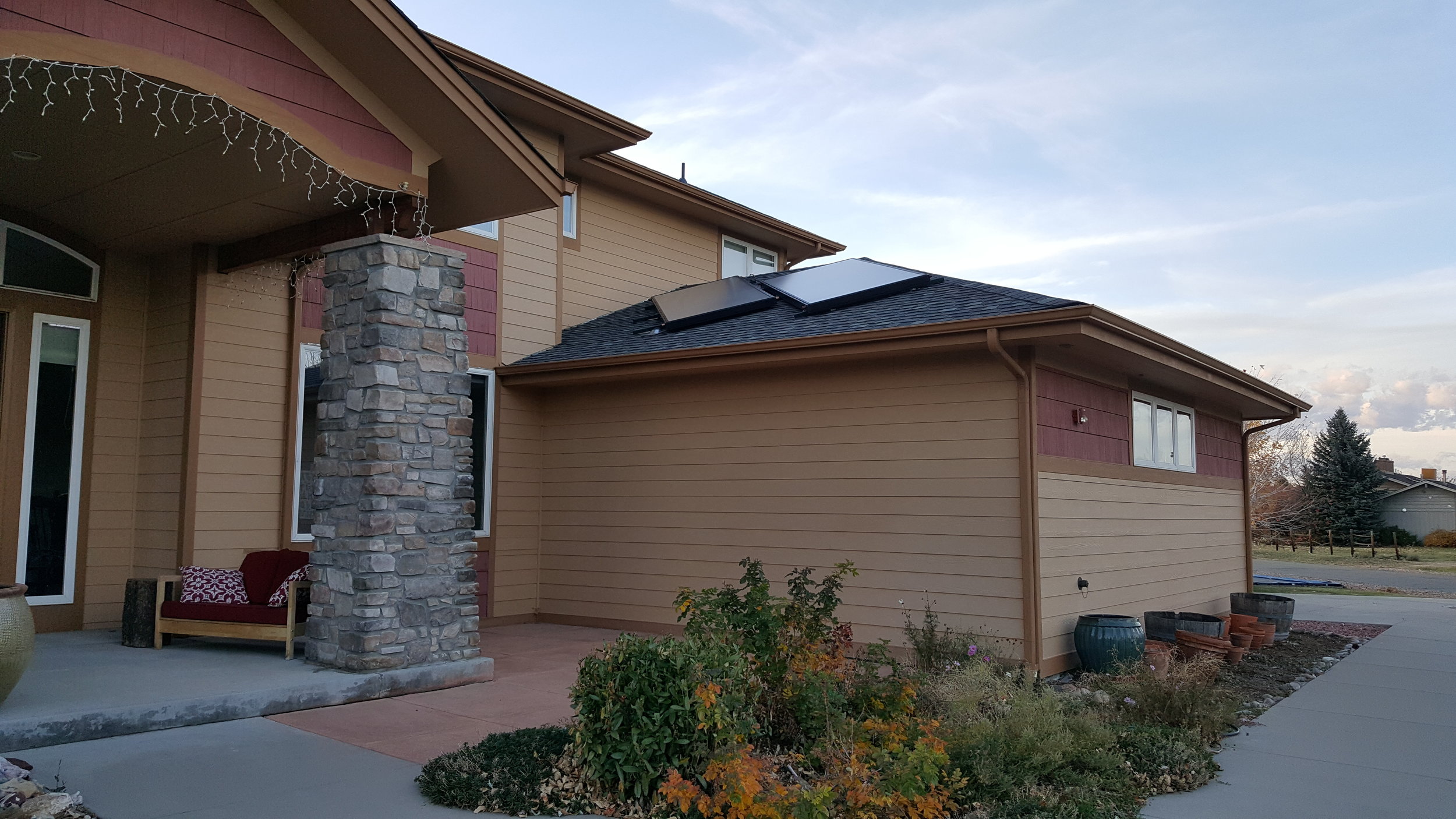 Flush mounted, offset & piped in series solar thermal array in Boulder, Colorado