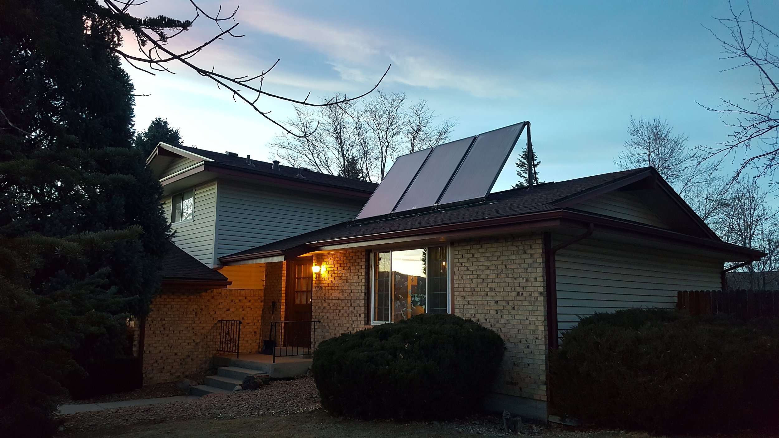 Tilt up, three solar thermal panel system in Boulder, Colorado