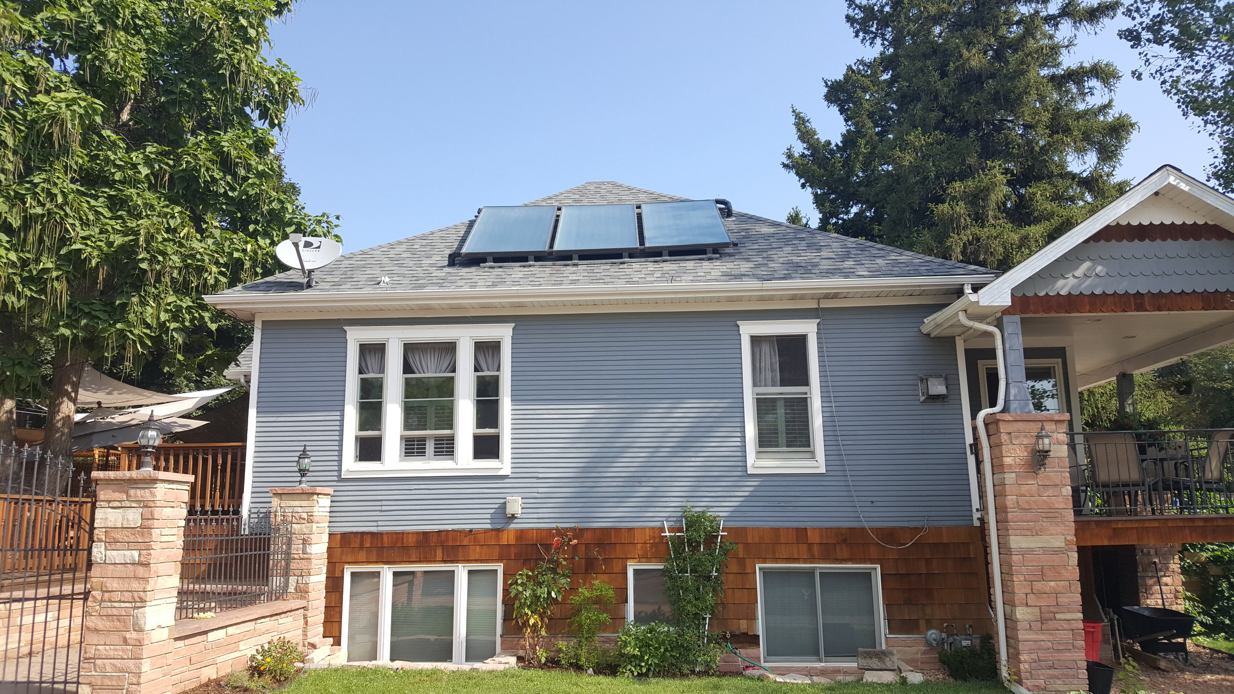Three flush mounted solar hot water panels in Louisville, Colorado