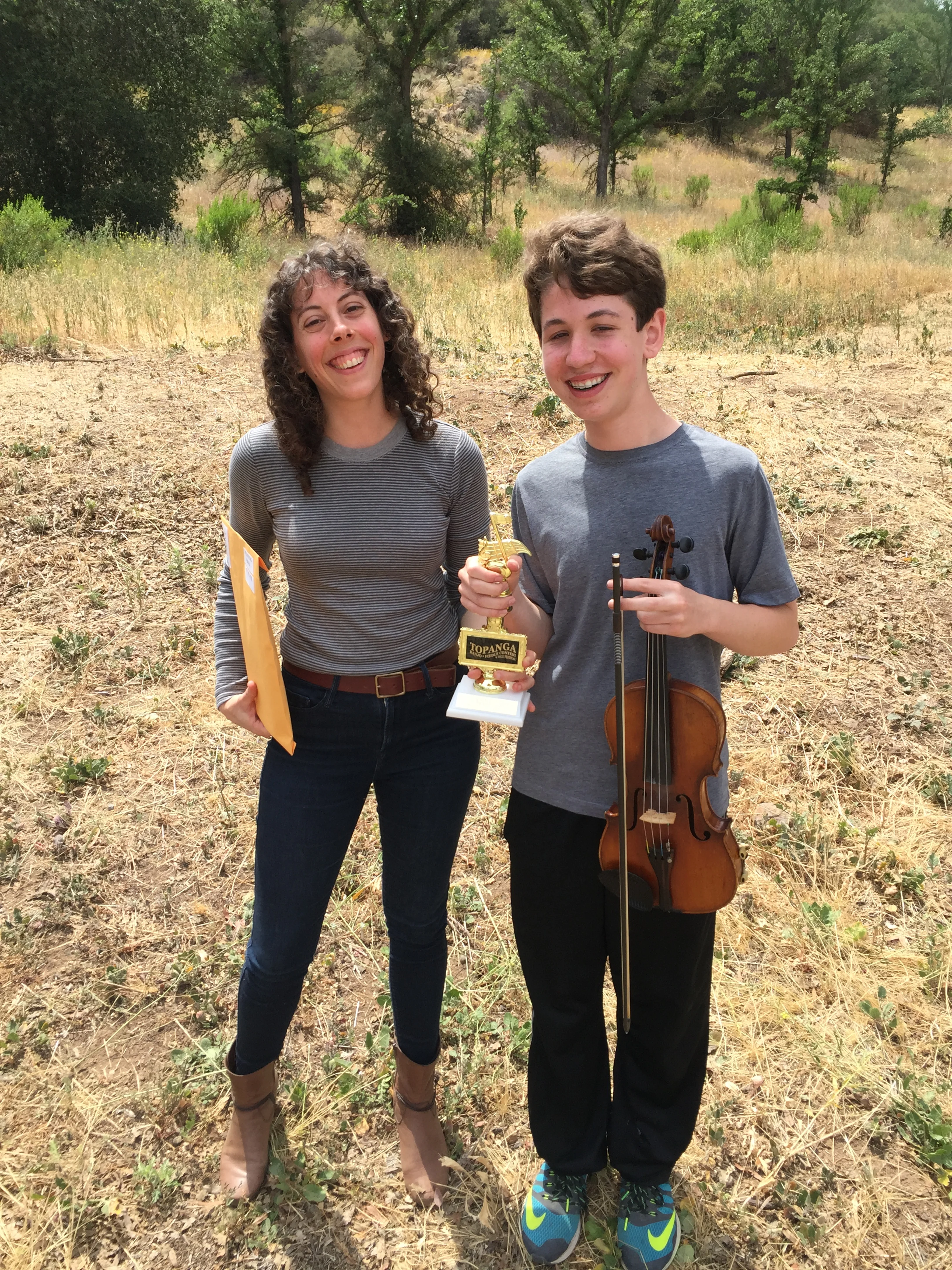 Michael and myself at the 55th Annual Topnaga Banjo Fiddle Contest holding the 1st place trophy for Beginner Fiddle.