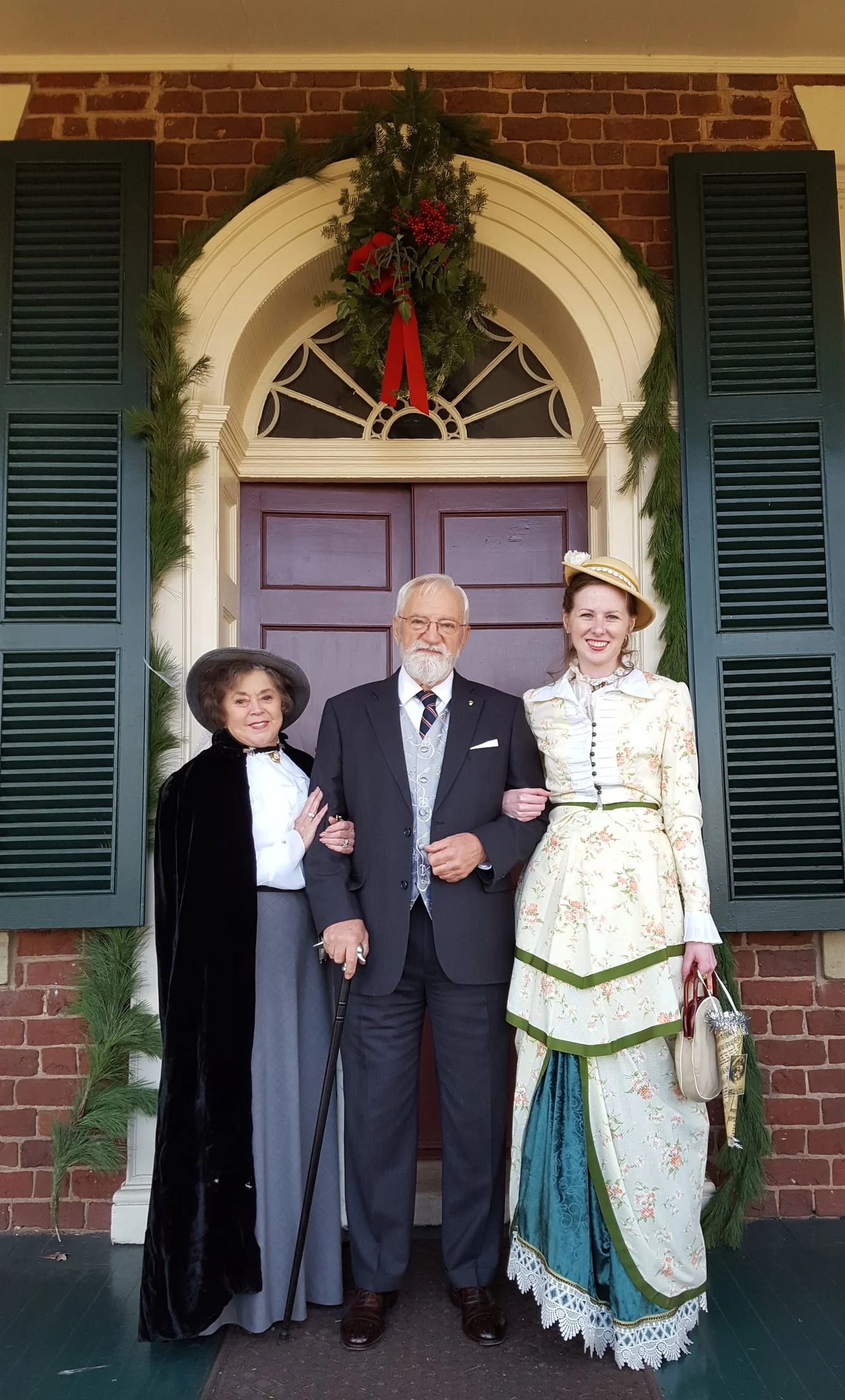 Lucy, Howard, Hope on front porch.jpg