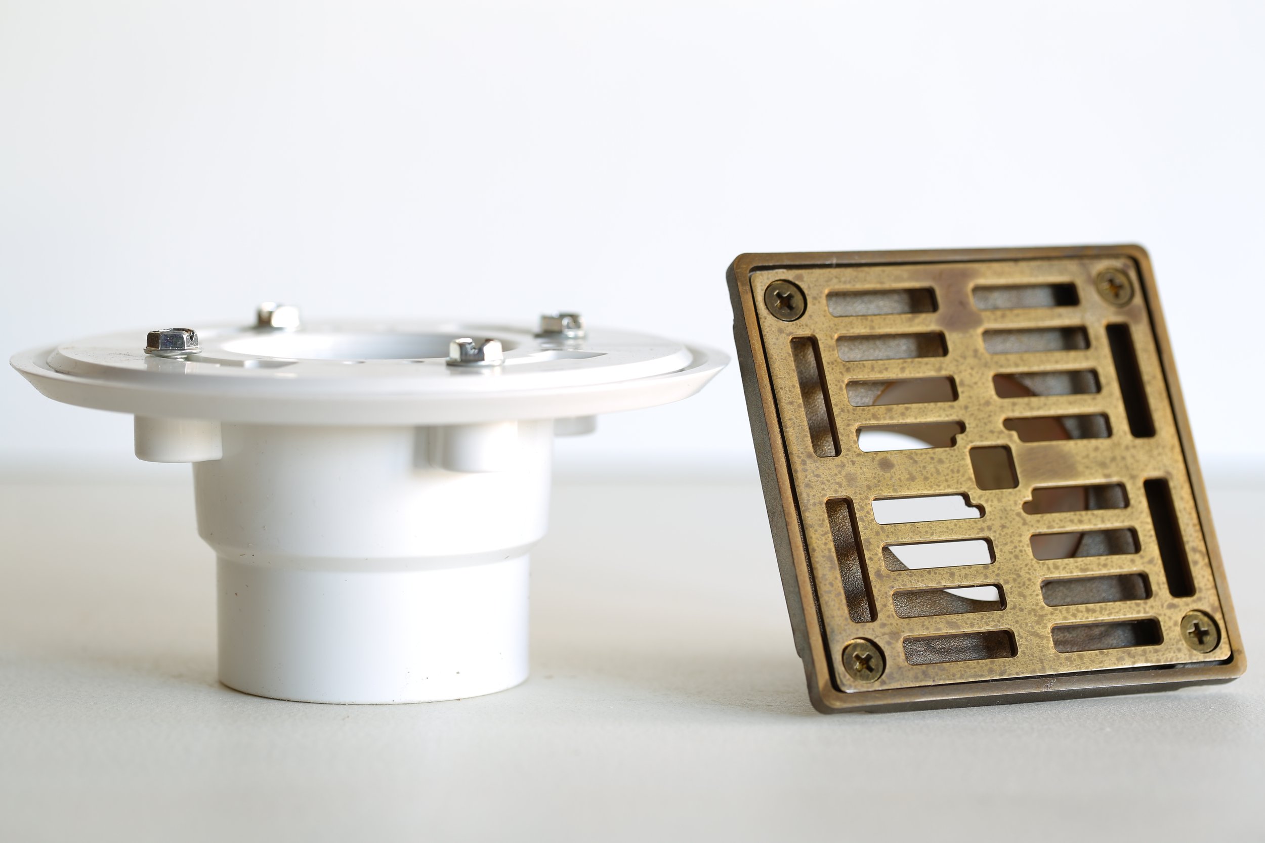 Brass drrain square PVC.jpg