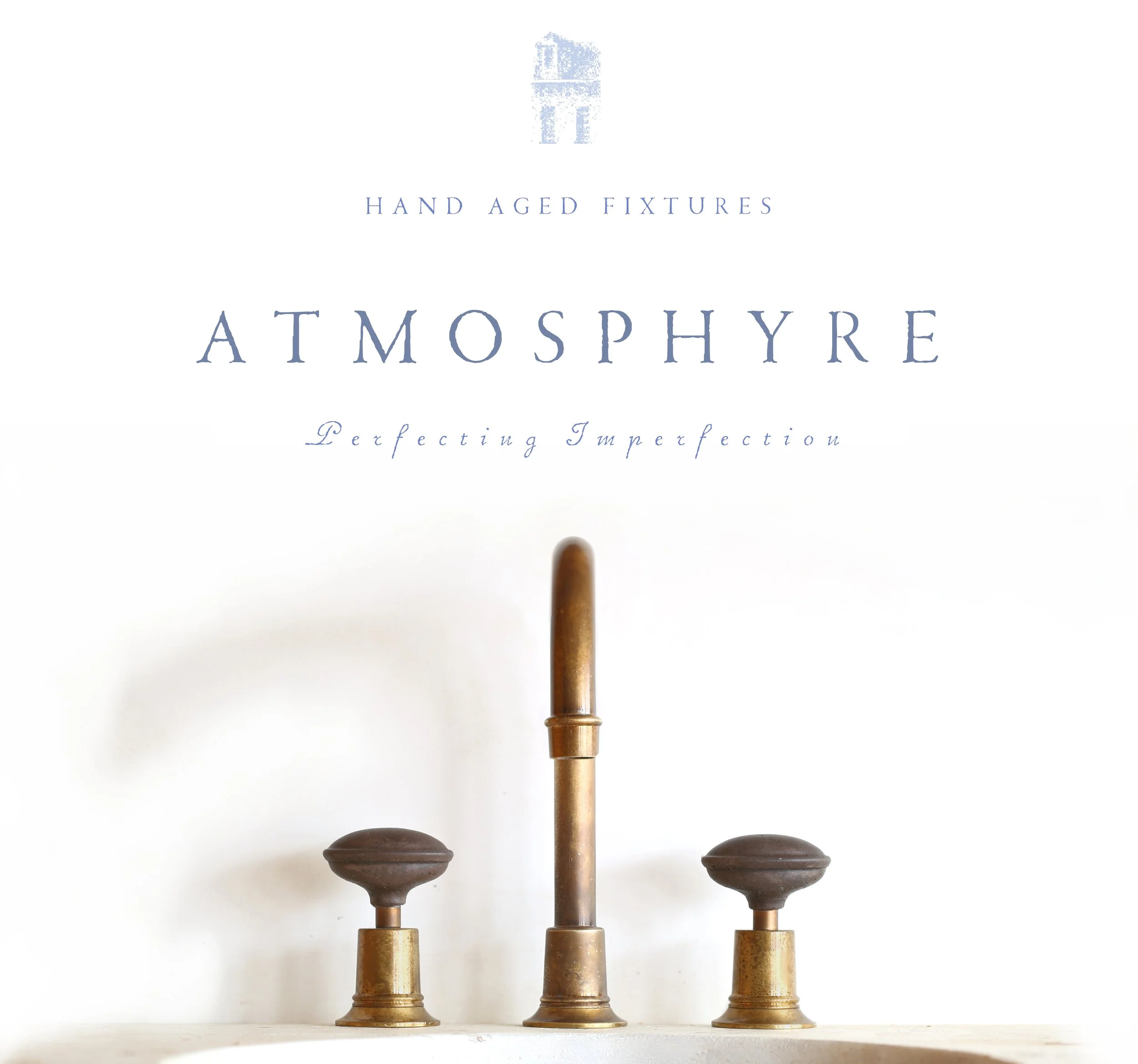 Handcrafted luxury bathroom with aged brass faucets and concrete vessel sink in a modern high-end home