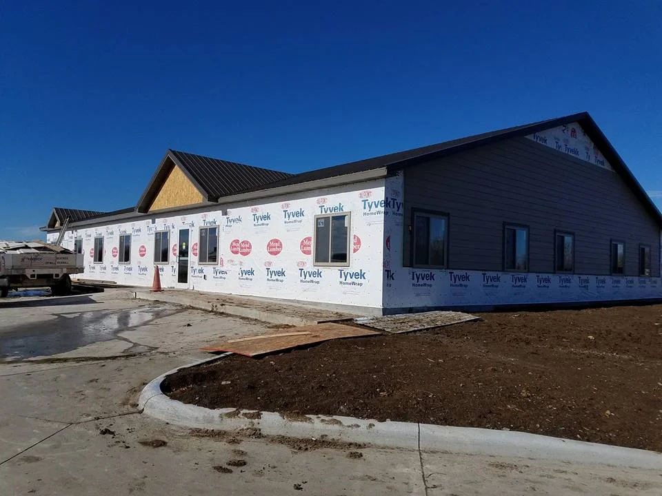 New building progress, siding is being installed!