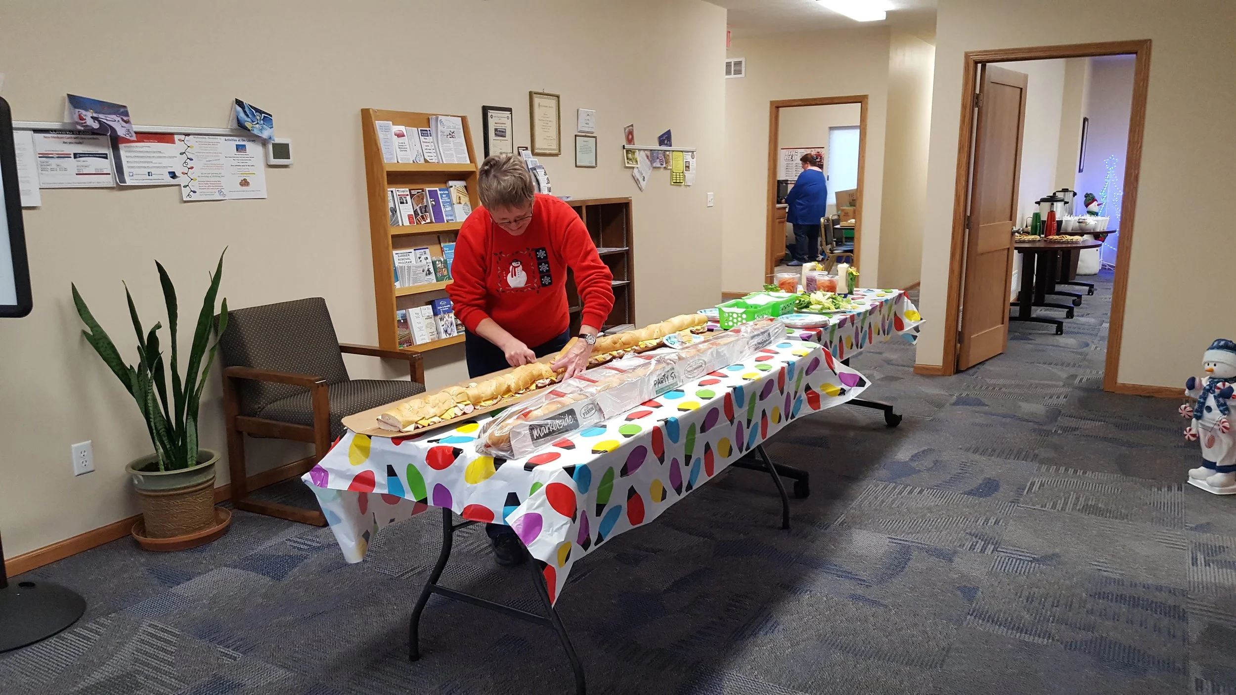 Blue Rivers Beatrice Public Transportation Dispatcher Wanda Franken prepping the meal for the Holiday Lights Tour 2017.