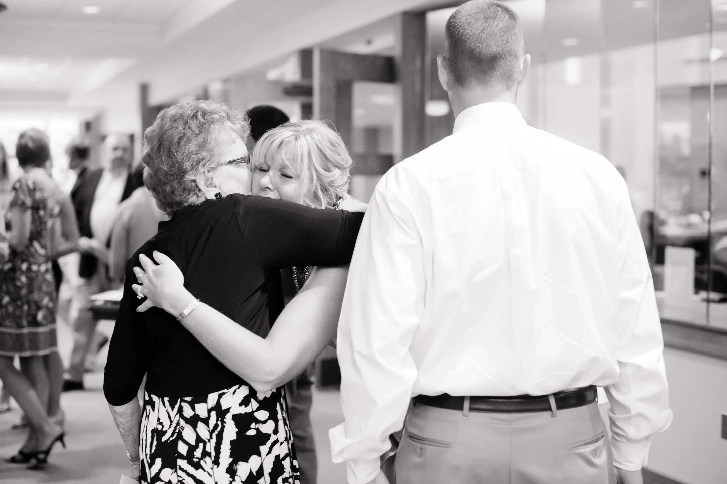 My mom hugging her mom at my wedding. Zero tears were shed that day. That is false. {Photo by TAK Photography.}