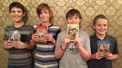 Michael, Seth, Alex, and Kyle are members of “The Great Brain Book Club”