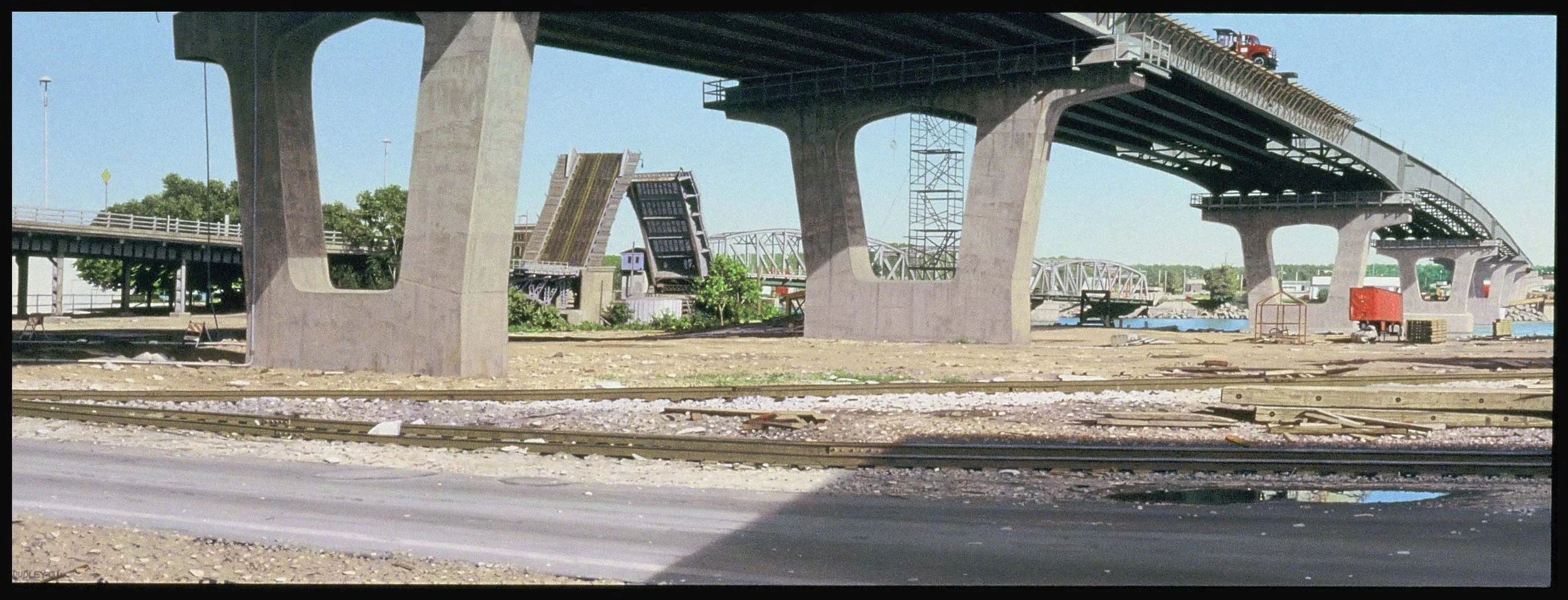 Two Bridges Crossing the IL River - Peoria IL  2001,  9" x 24 1/4  oil on panel