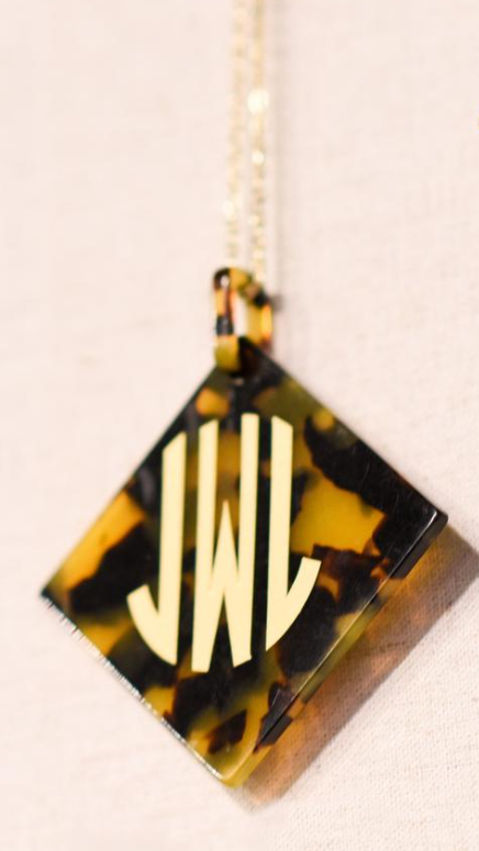 Tort Dark Gold Mono.png