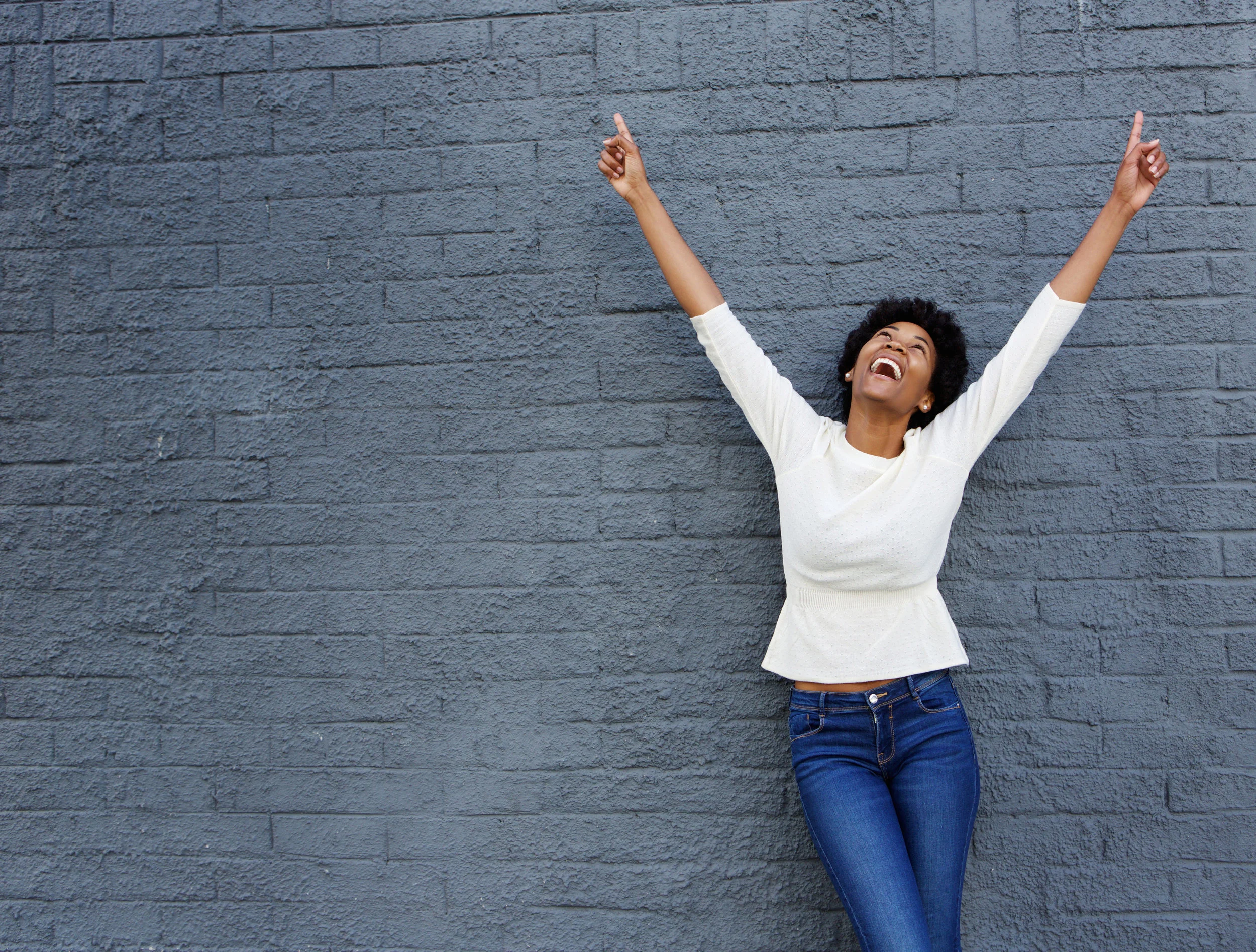 bigstock-Cheerful-African-Woman-With-Ha-115566287.jpg