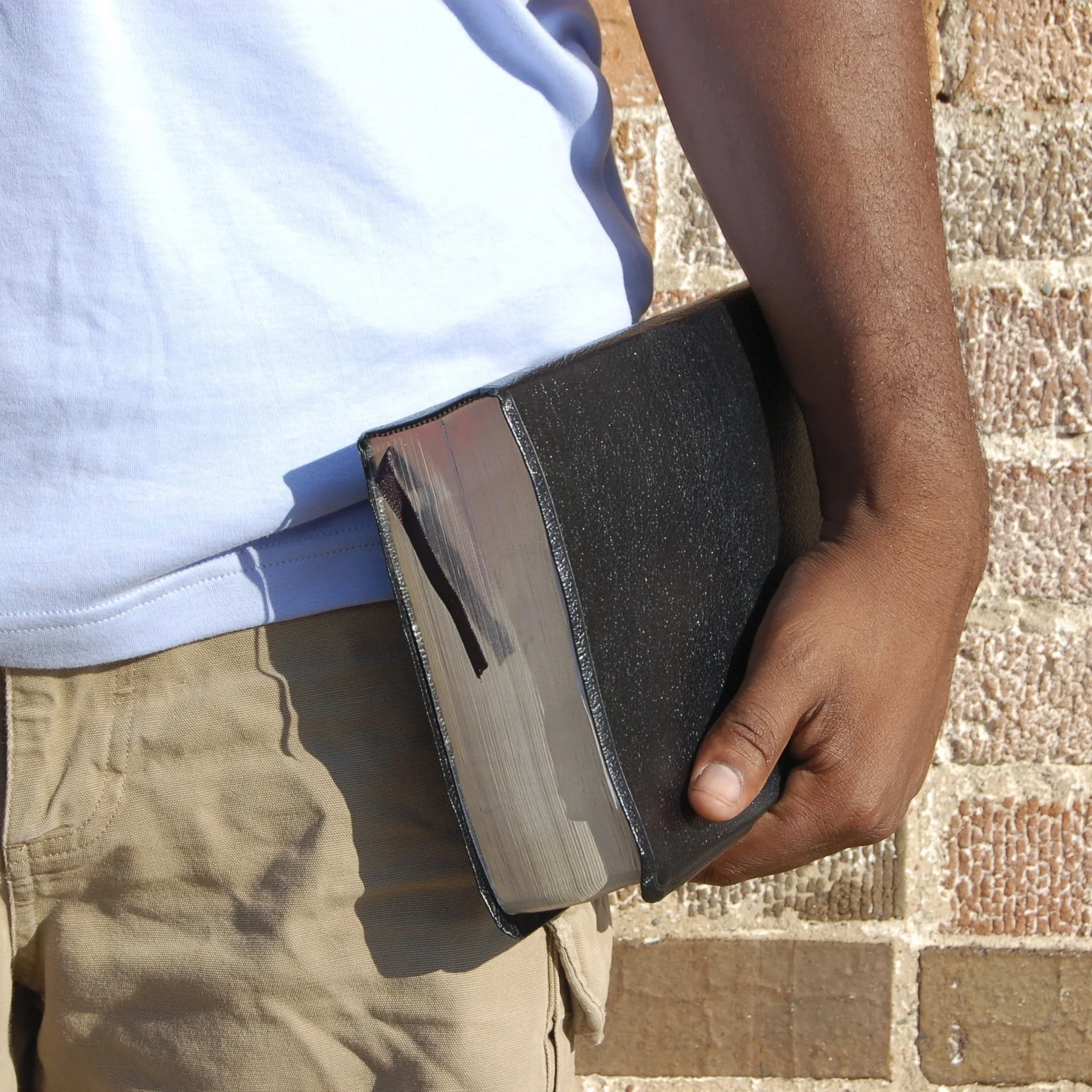 man-carrying-bible.jpg