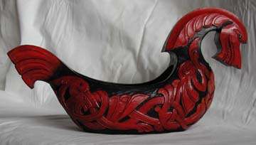 Dragon ale bowl dark on red.