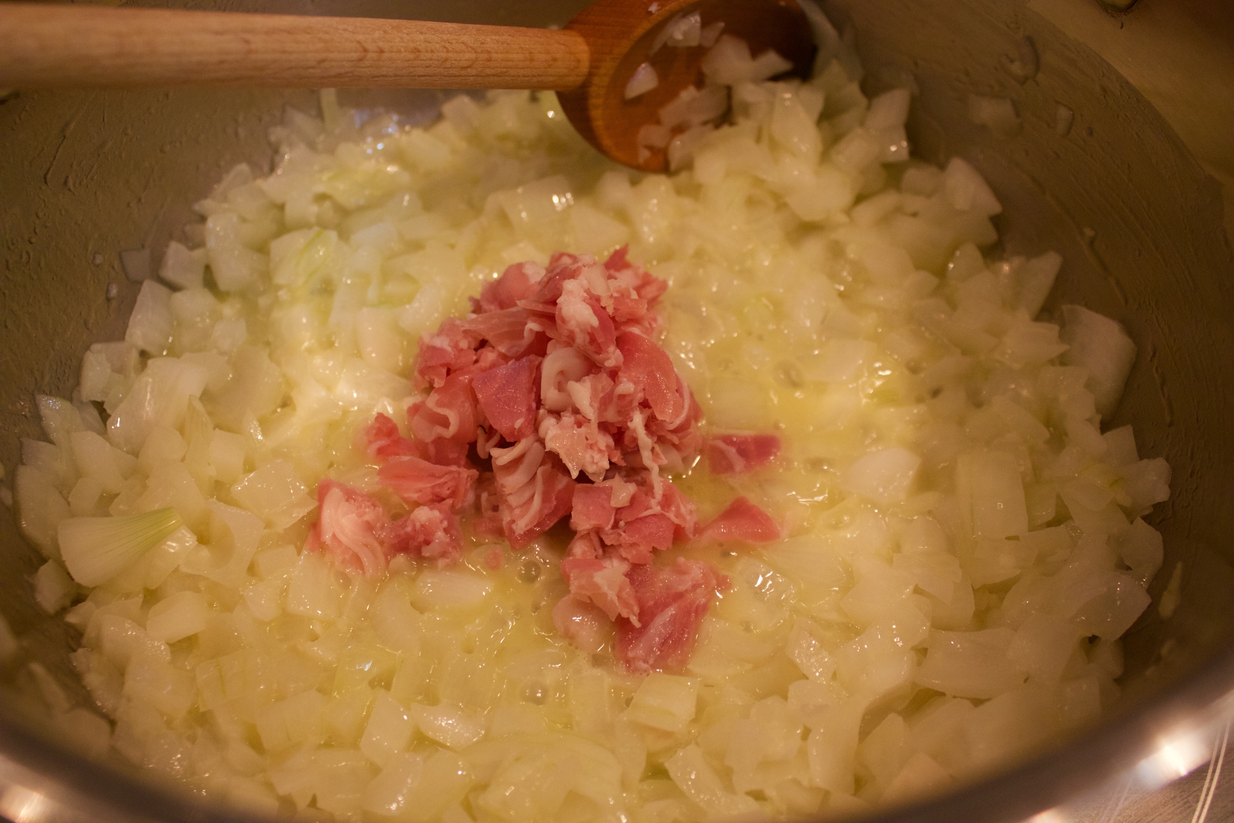 6. Add pancetta to pot and combine