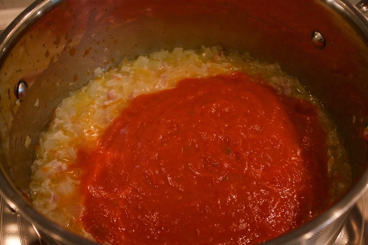 9. Once there, add marinara sauce to the pot