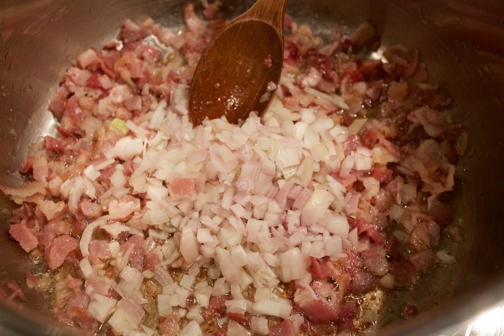 3) Add shallots to the bacon and stir to combine; let cook 2-3 minutes