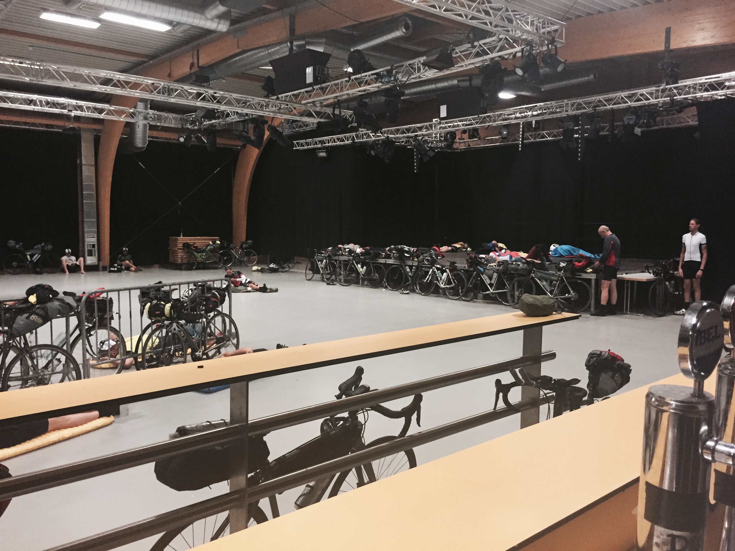 Registation hall featuring sleeping cyclists 