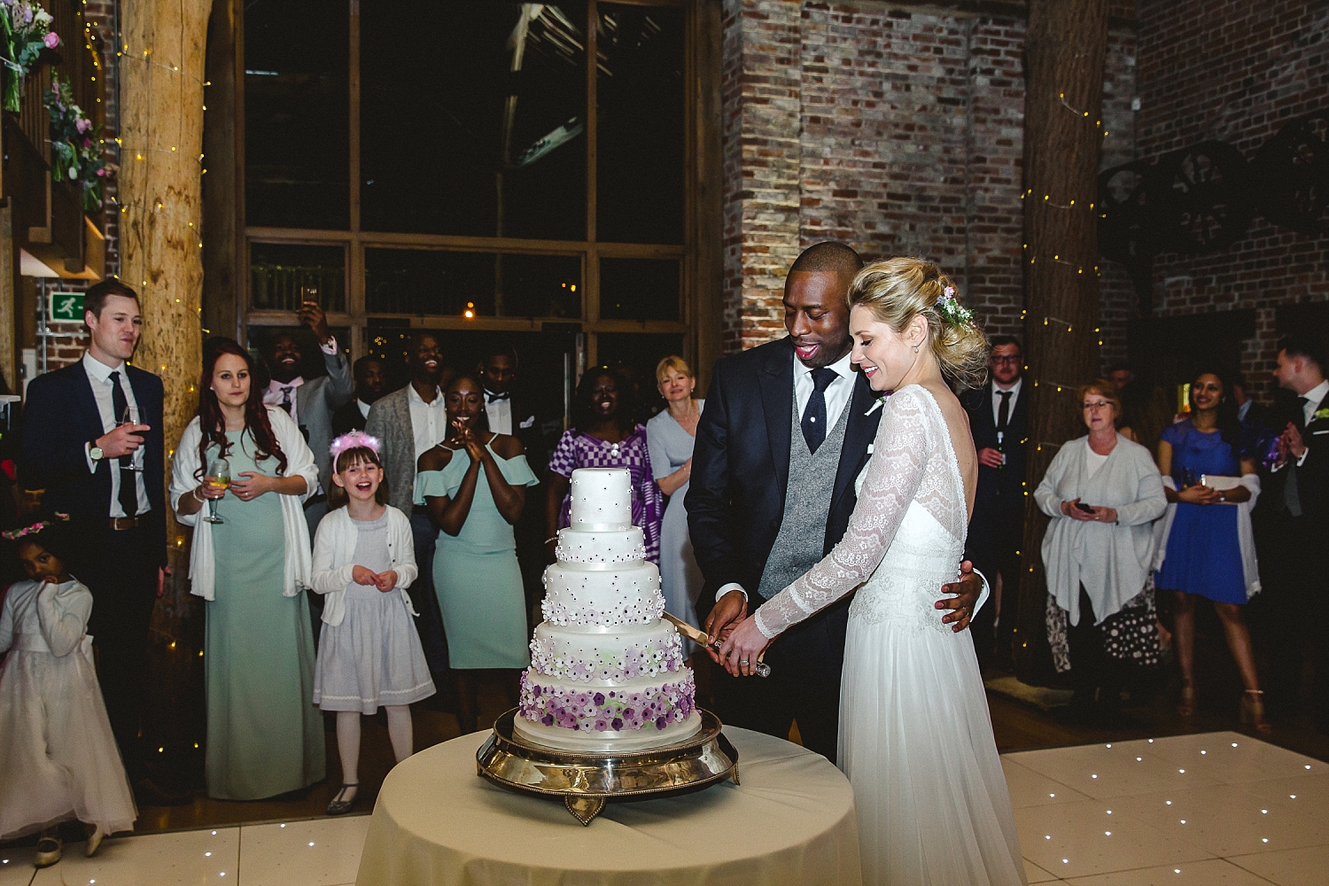 Gaynes Park Wedding Photographer - Cake Cutting on the Dancefloor