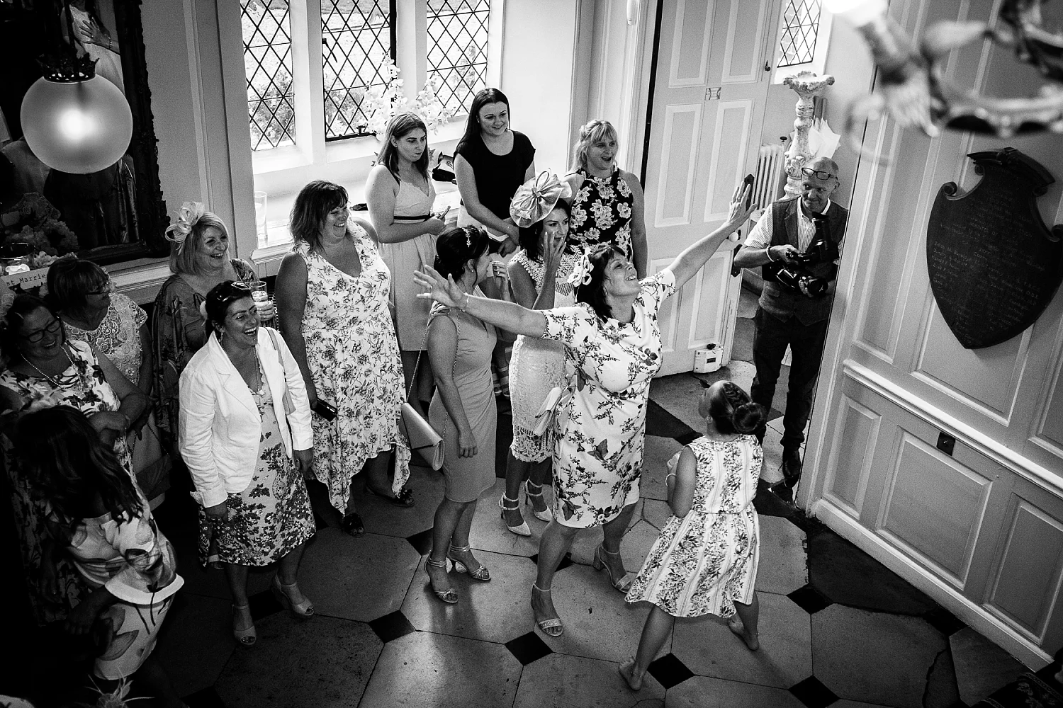 Gosfield Hall Essex Wedding - Bride Throwing the Bouquet