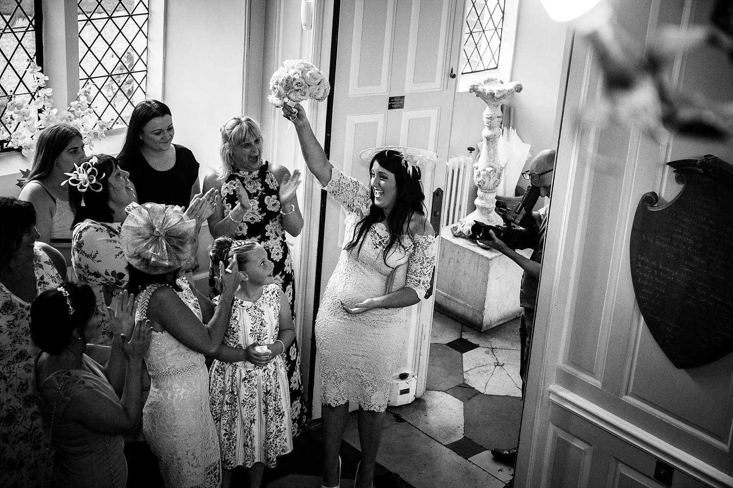 Gosfield Hall Essex Wedding - Bride Throwing the Bouquet