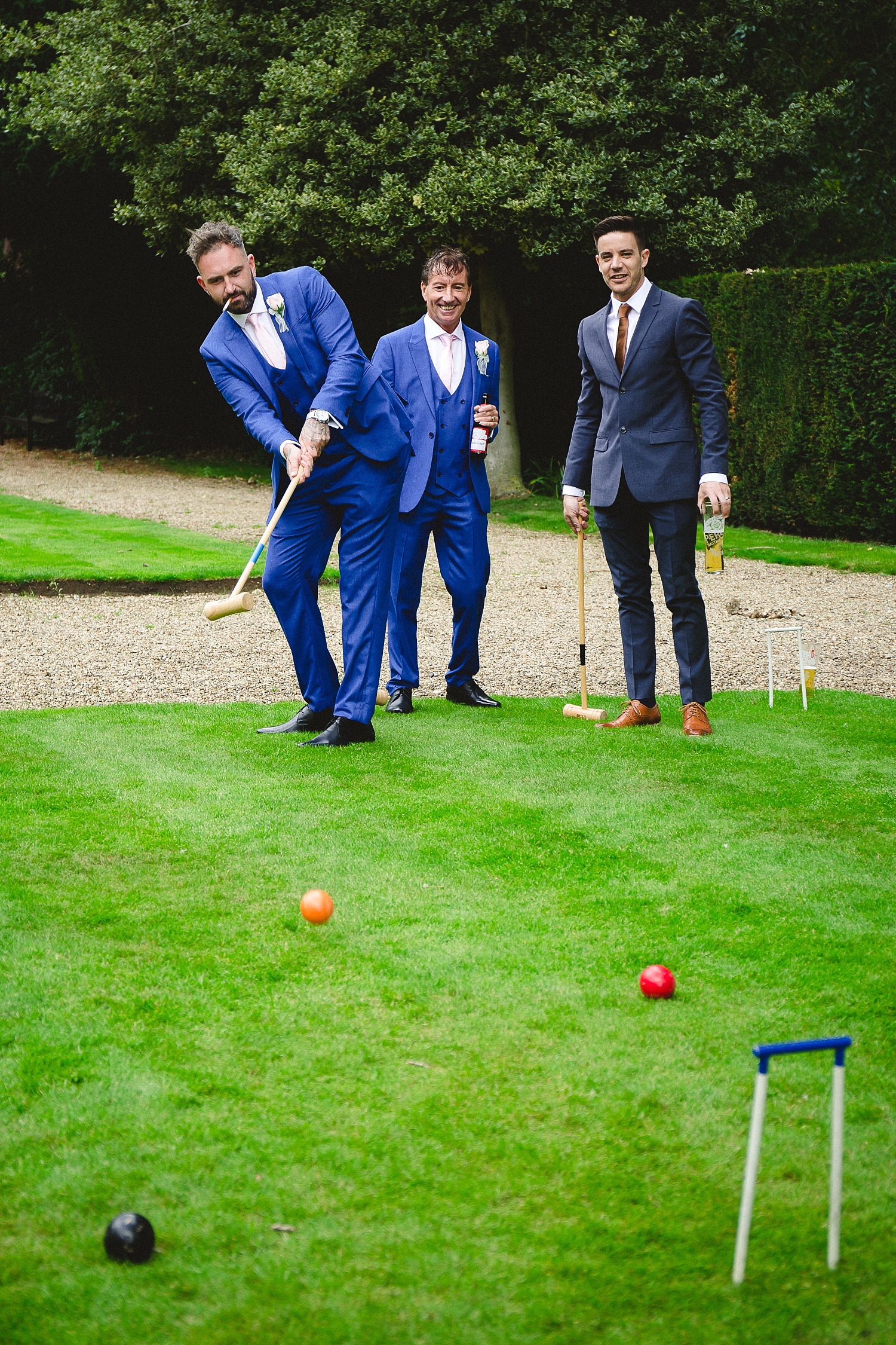 Gosfield Hall Wedding Photography - Groom's Party playing Croquet
