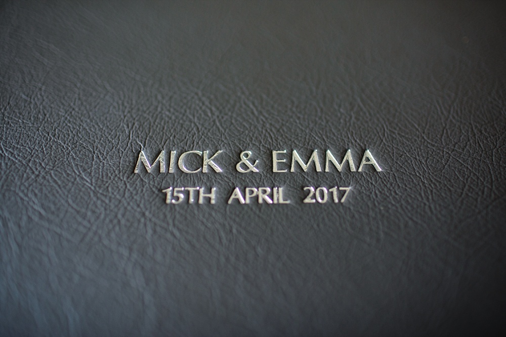 Black leather cover wedding album with silver embossing