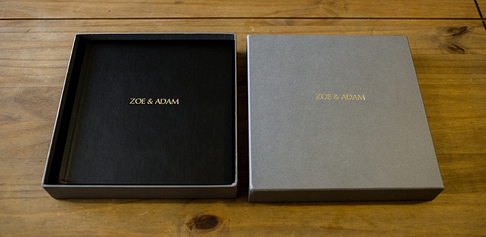 Black leather wedding album with gold embossing