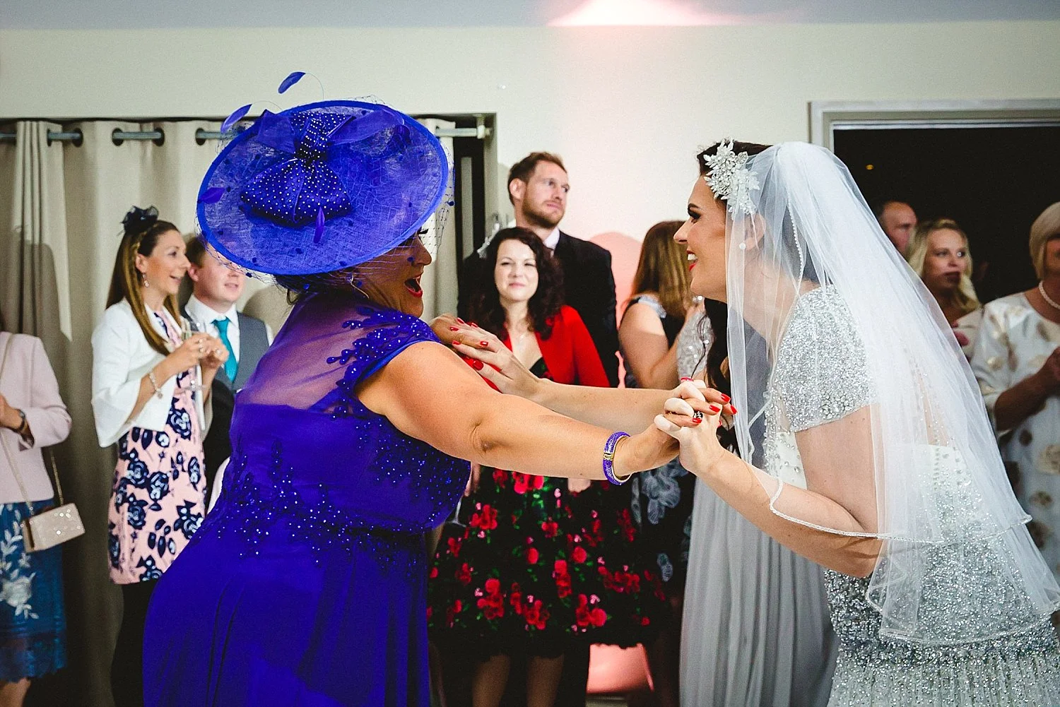 Houchins Wedding Photographer - Bride and mother of the bride dancing