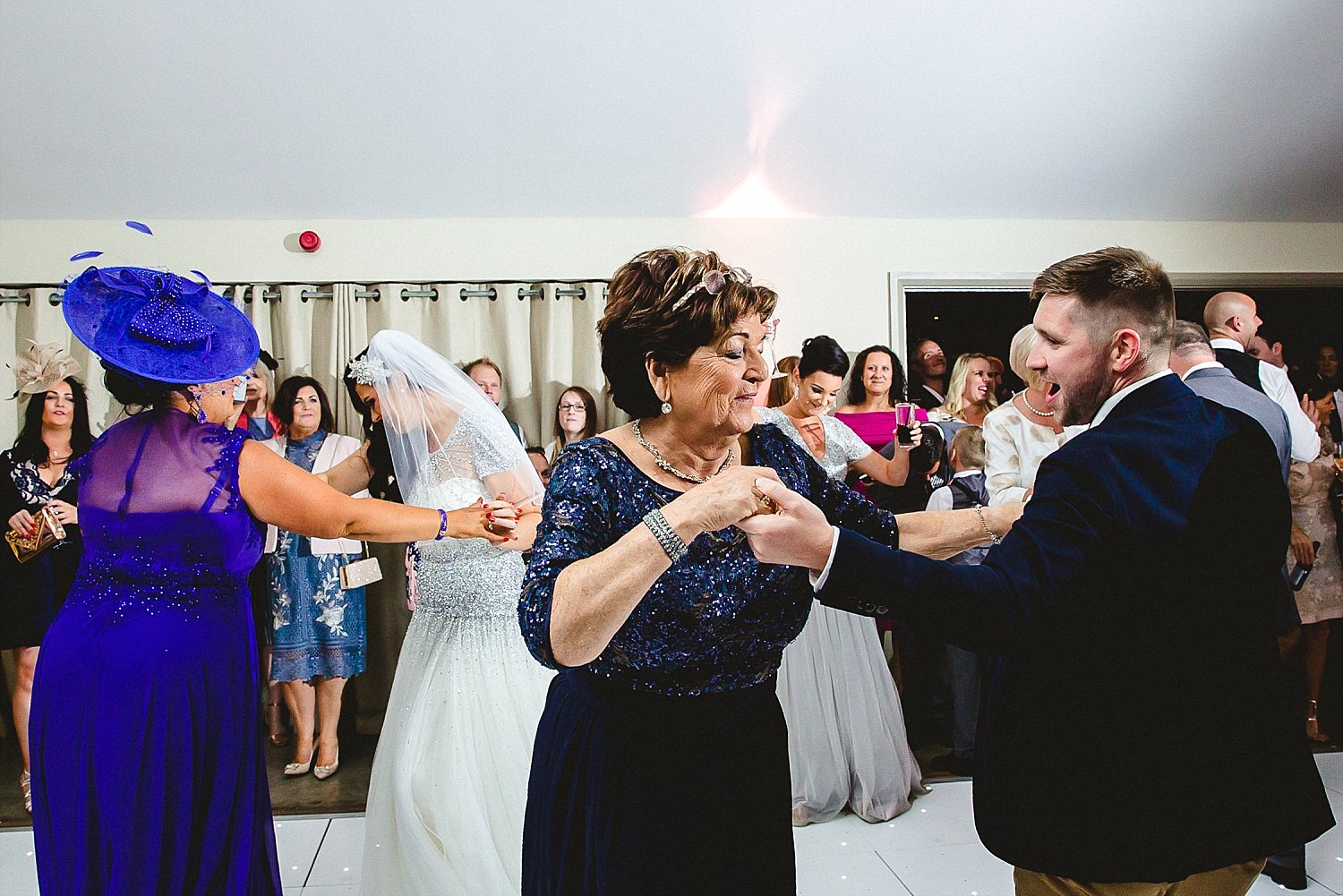 Houchins Wedding Photographer - Guests dancing
