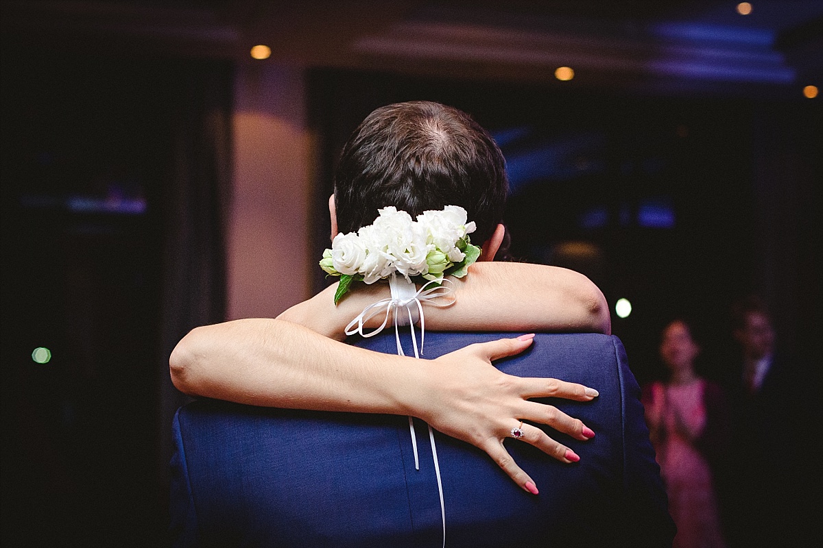 Bride and Groom hugging on the dancefloor